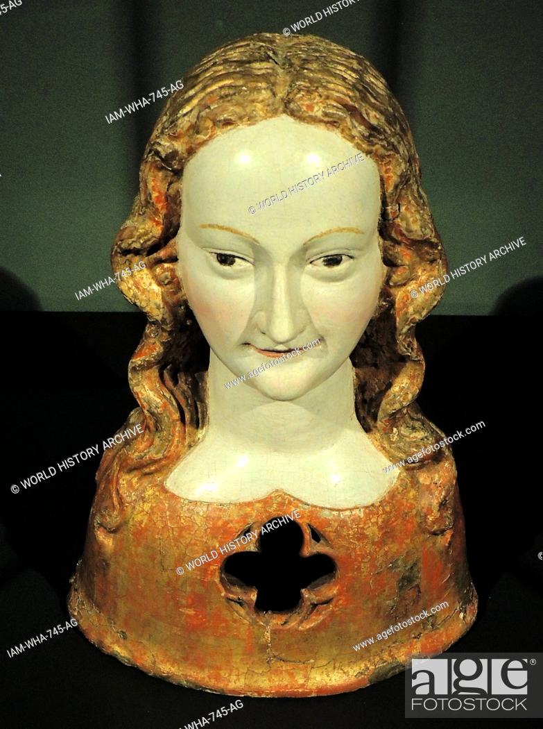 Stock Photo: Reliquary bust of one of Saint Ursula's virgins. Cologne, c 1325-1350, walnut with old polychromy. According to legend, the Christian princess Ursula and her.