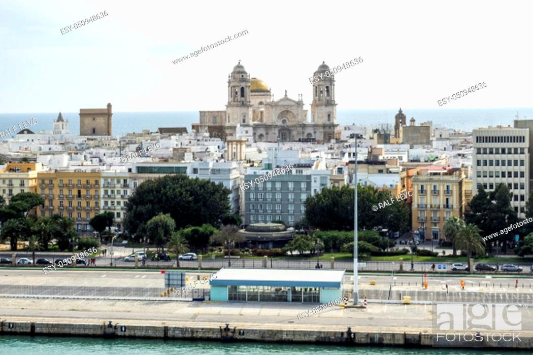 Stock Photo: Spain, Harbor of Cadiz with the Cathedral of the Holy Cross over the Sea.