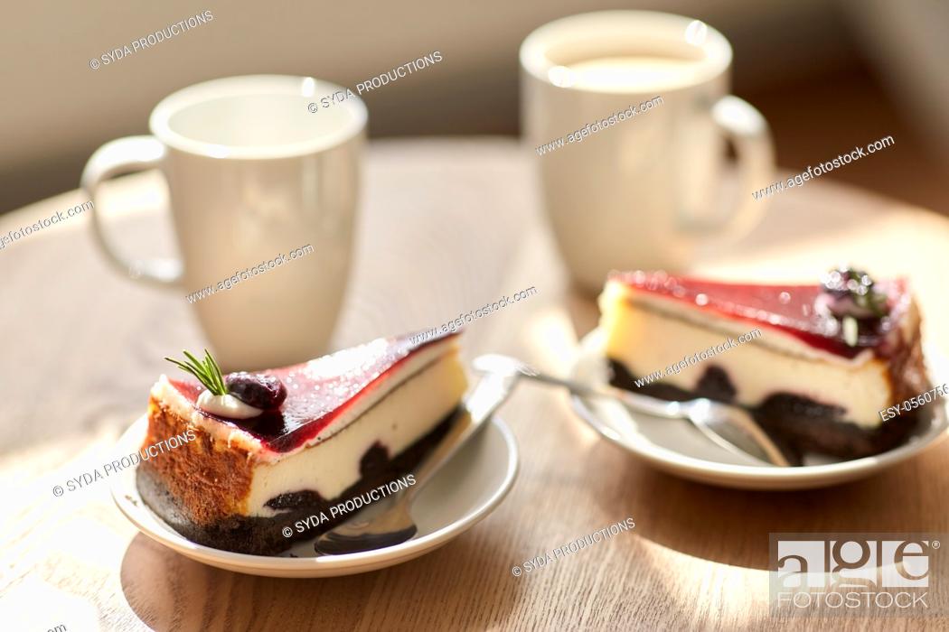 Stock Photo: piece of chocolate cake on wooden table.