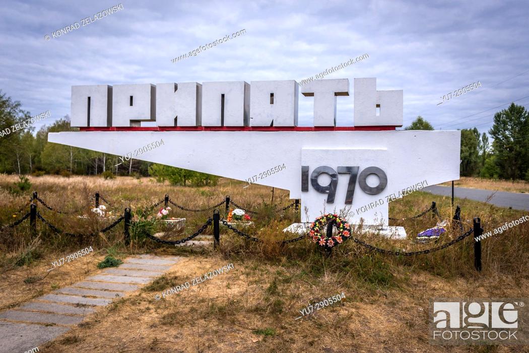 Stock Photo: Welcome sign of Pripyat city in Chernobyl Nuclear Power Plant Zone of Alienation exclusion area around the nuclear reactor disaster in Ukraine.