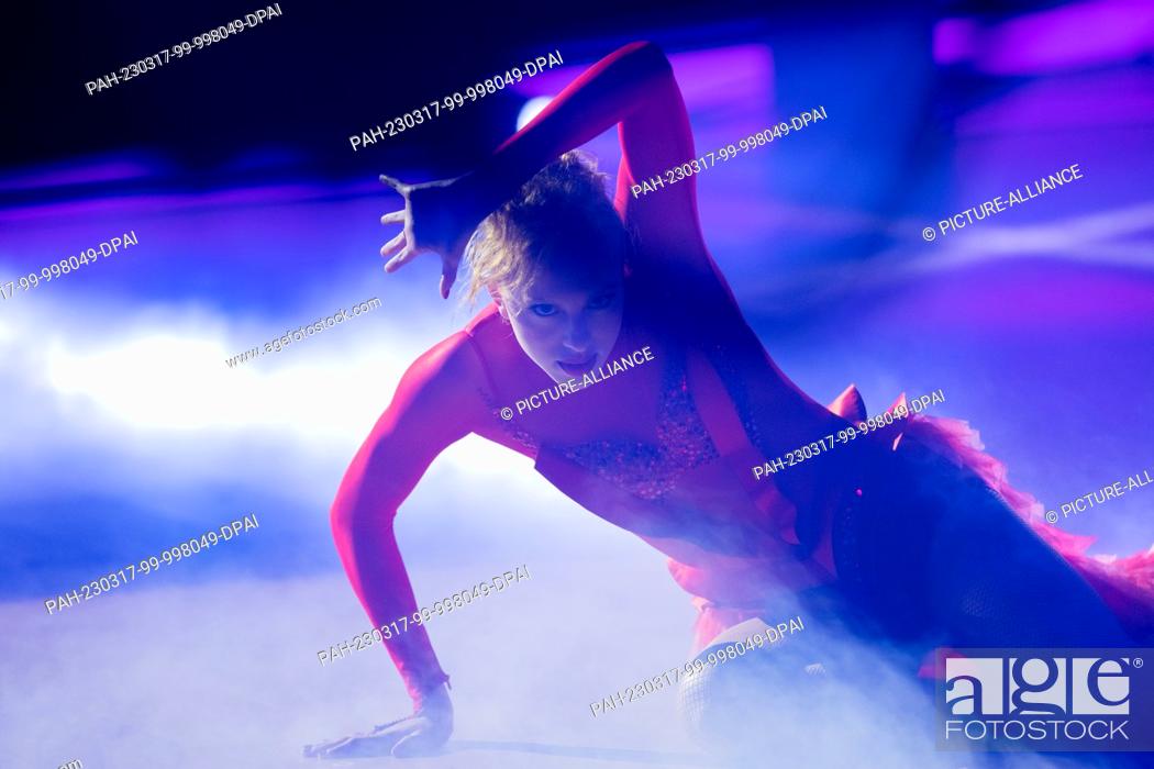 Stock Photo: 17 March 2023, North Rhine-Westphalia, Cologne: Anna Ermakova, model, and Lusin, professional dancer, dance in the RTL dance show ""Let's Dance"" at the.