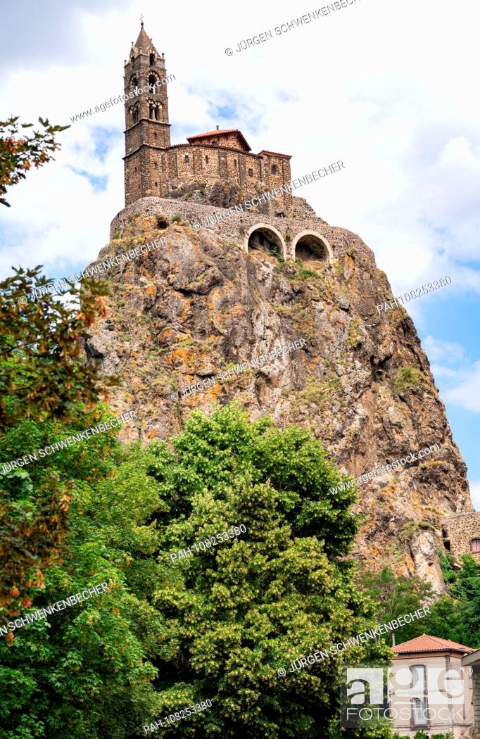 Stock Photo: High up on a basalt hilltop in the town of Le-Puy-en-Velay sits the church of Saint-Michel d'Aiguilhe (Saint Michael on the Needle).