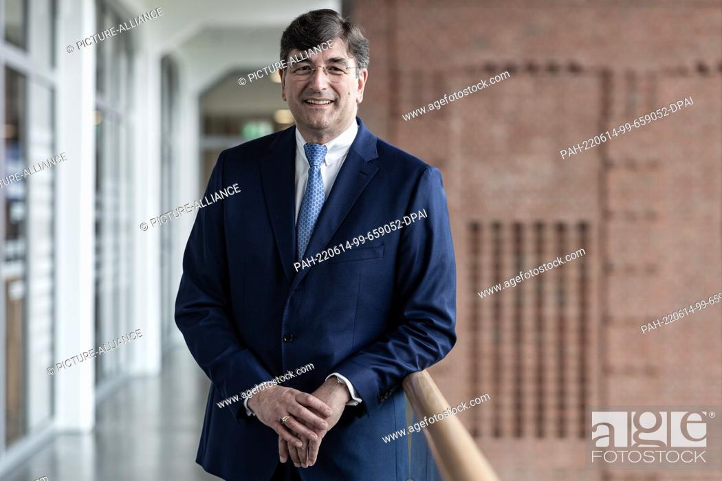 Stock Photo: 14 June 2022, North Rhine-Westphalia, Bielefeld: Albert Christmann, personally liable partner of Dr. August Oetker KG, stands in the stairwell of Dr.