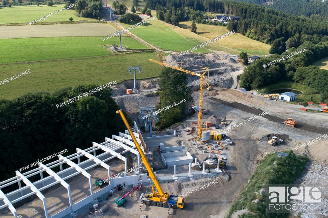 Stock Photo: 25 July 2018, Willingen, Germany: View of the bottom station of the new 8-seater chairlift ""K1 Willingen"" on the Köhlerhagen slope.