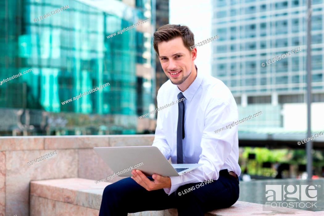 Stock Photo: Caucasian businessman use of the laptop computer.