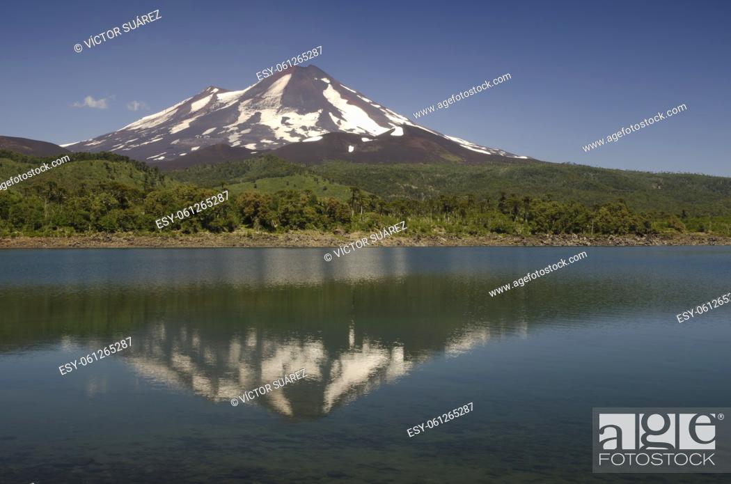 Stock Photo: Llaima volcano reflected on the Conguillio lake. Conguillio National Park. Araucania Region. Chile.