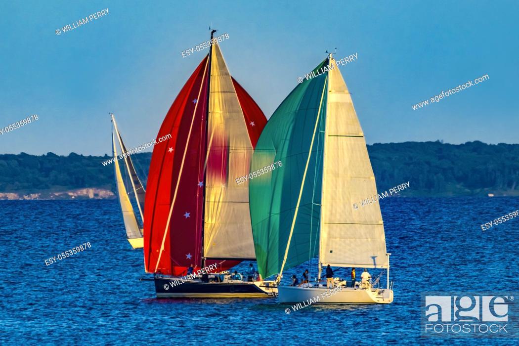 Stock Photo: Colorful Sailboats Spinnakers Racing Padanaram Harbor Buzzards Bay Dartmouth Masschusetts.