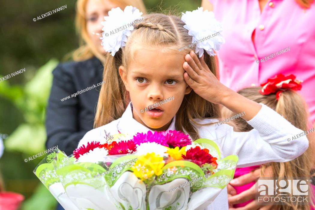 Stock Photo: In first-grade headache before going to school the first of September.