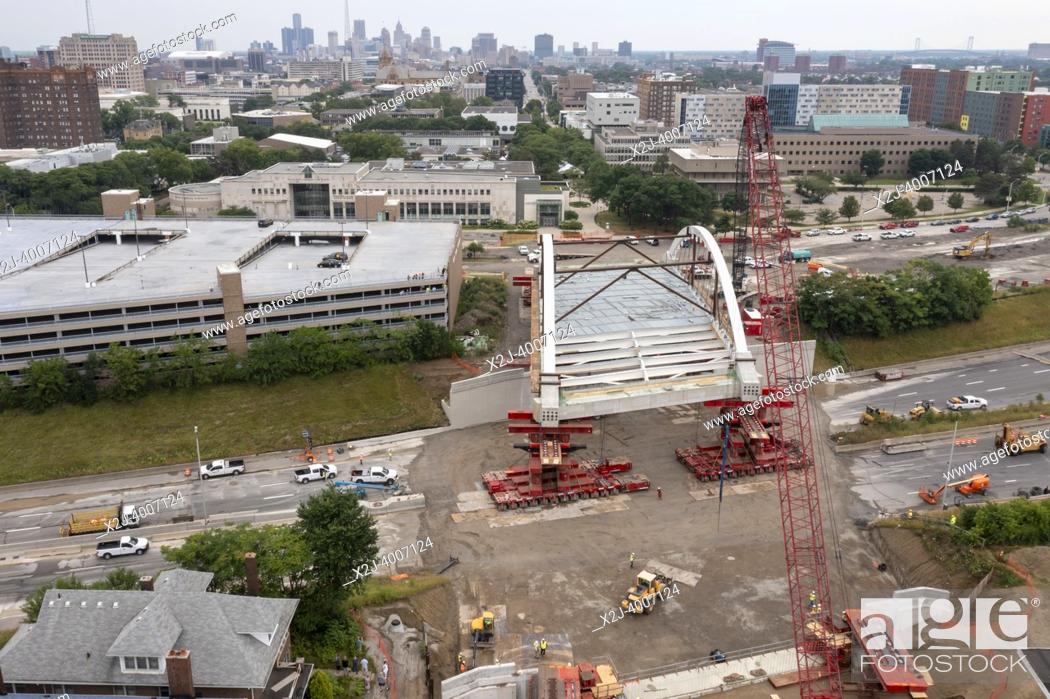 Stock Photo: Detroit, Michigan USA - 24 July 2022 - The new Second Avenue bridge is rolled into place across Interstate 94. The 5, 000.