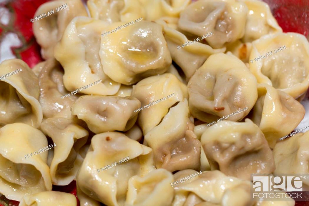 Stock Photo: ravioli with mushroom and cabbage for christmas.