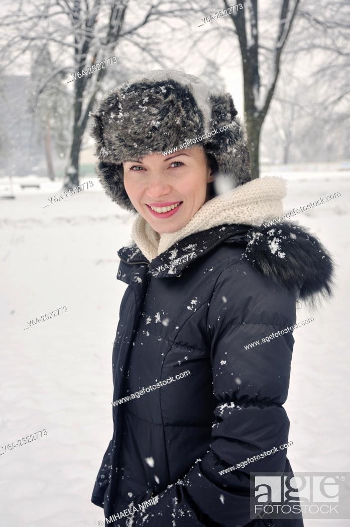 Stock Photo: Smiling mid adult woman portrait, winter.