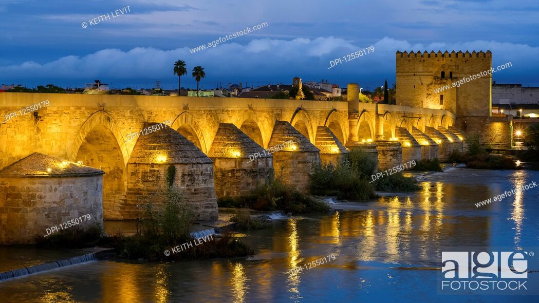 Stock Photo: Guadalquivir River, Roman bridge of Cordoba; Cordoba, Malaga, Spain.