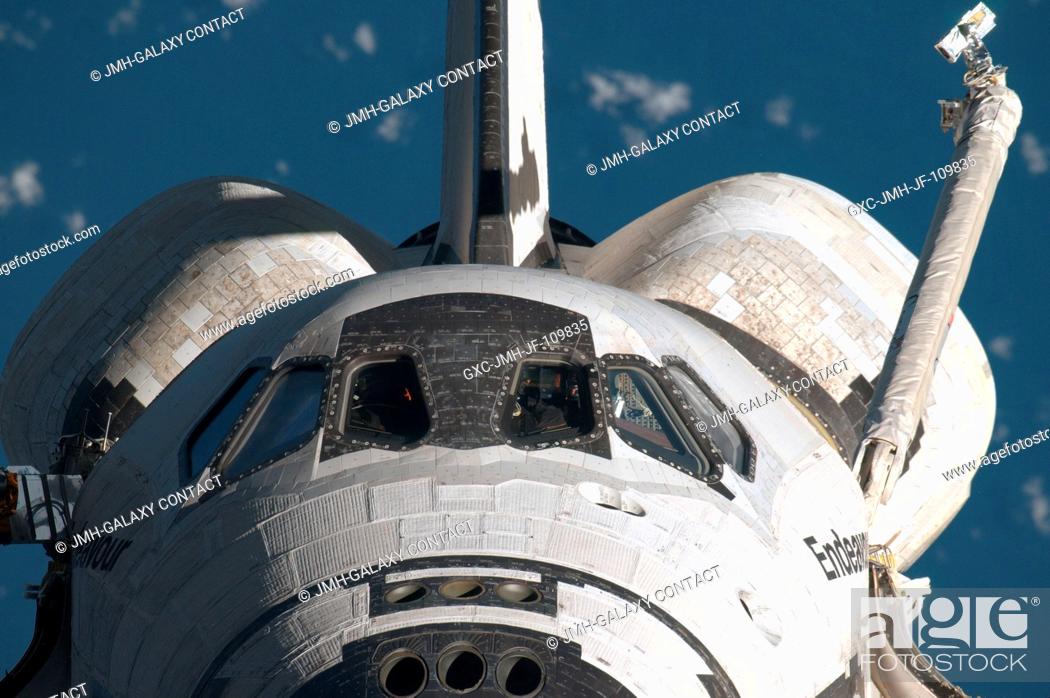 Stock Photo: This head-on view of the Space Shuttle Endeavour was provided by an Expedition 20 crewmember during a survey of the approaching vehicle prior to docking with.