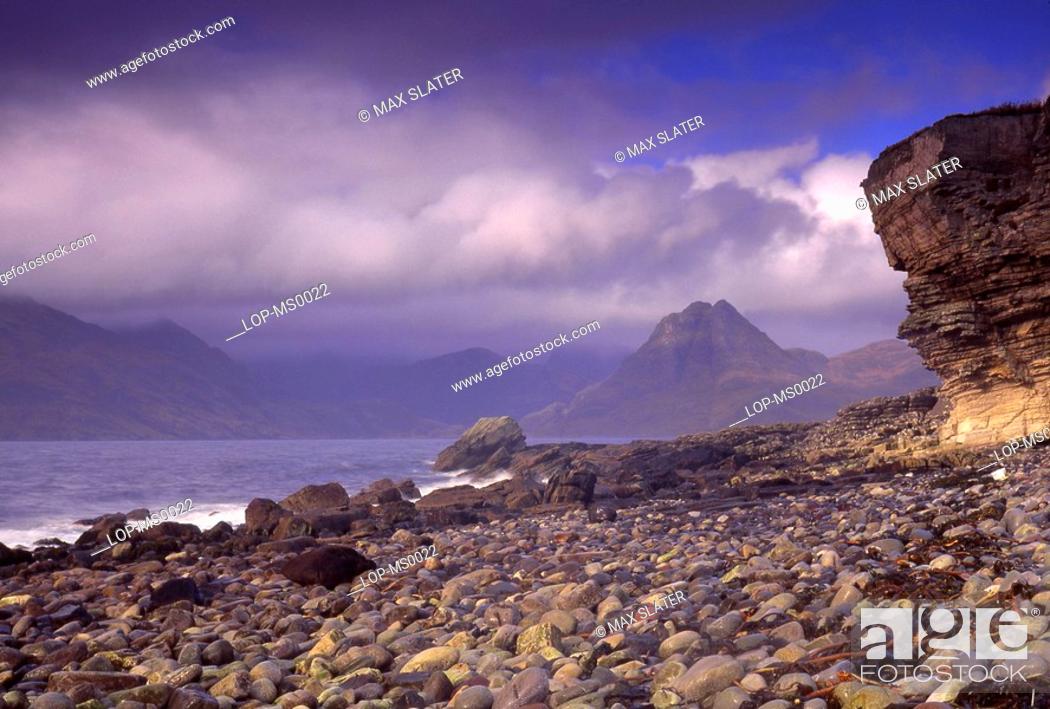 Stock Photo: Scotland, Isle of Skye, Strathaird, View of beach with eroded cliff face.