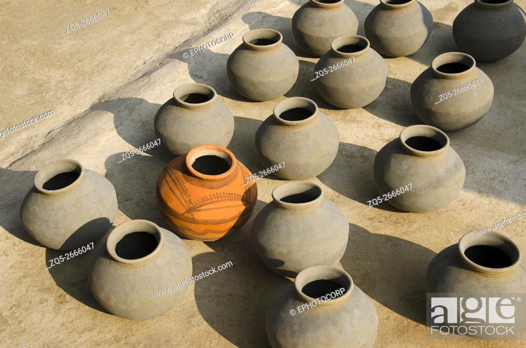 Stock Photo: Earthen pots, Near South - Eastern group of temples of Hindu and Jain temples, Khajuraho, Madhya Pradesh, India.