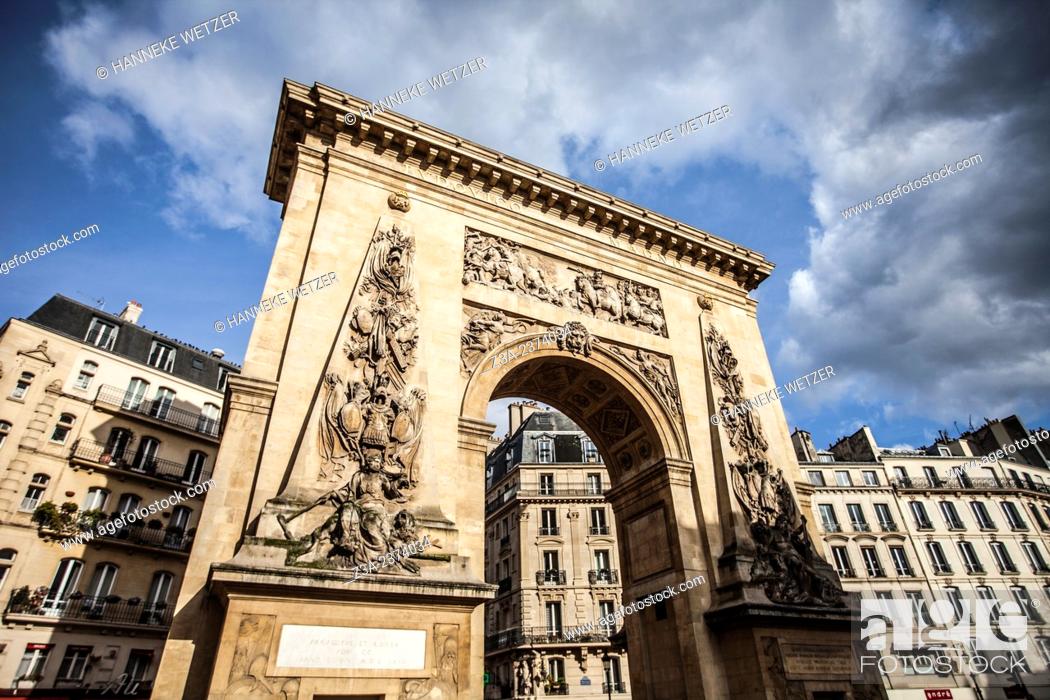 Stock Photo: The Porte Saint-Denis is a Parisian monument located in the 10th arrondissement, at the site of one of the gates of the Wall of Charles V.