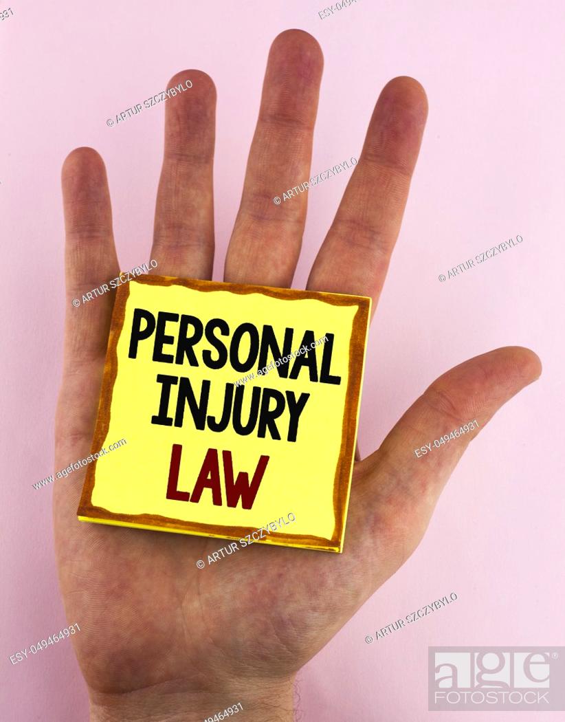 Stock Photo: Word writing text Personal Injury Law. Business concept for guarantee your rights in case of hazards or risks written Sticky Note Paper placed the Hand the.