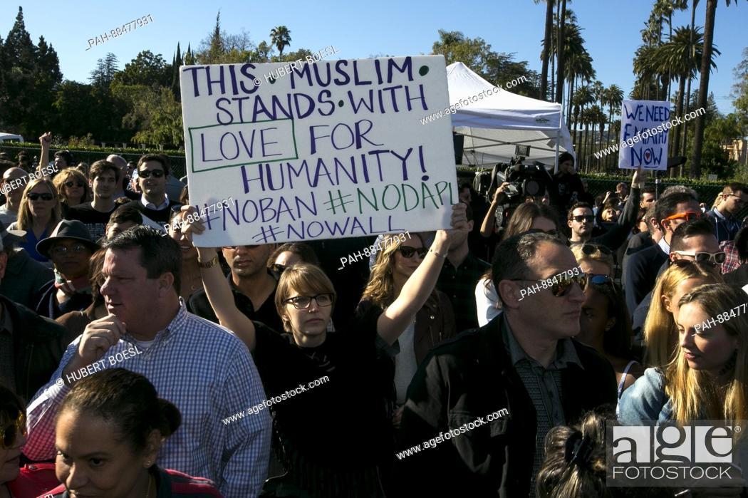 Stock Photo: Protesters attend the United Talent Agency's United Voices Rally against Donald Trump's politics at UTA Plaza in Beverly Hills, Los Angeles USA.