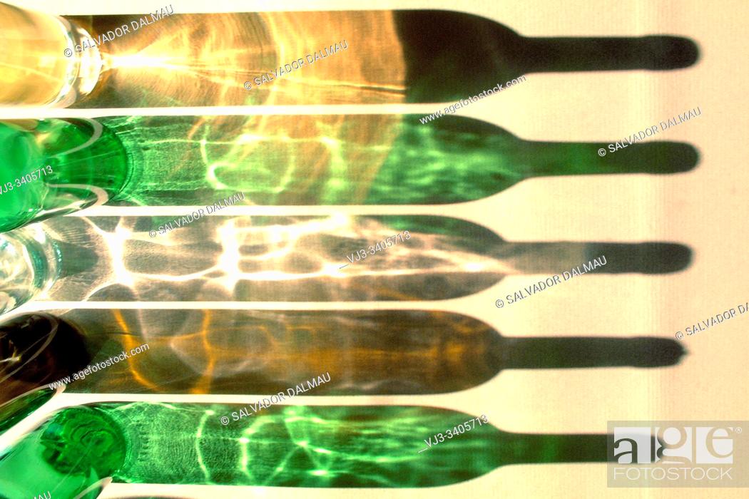 Imagen: creative shadows of bottles, location girona, catalonia, spain.