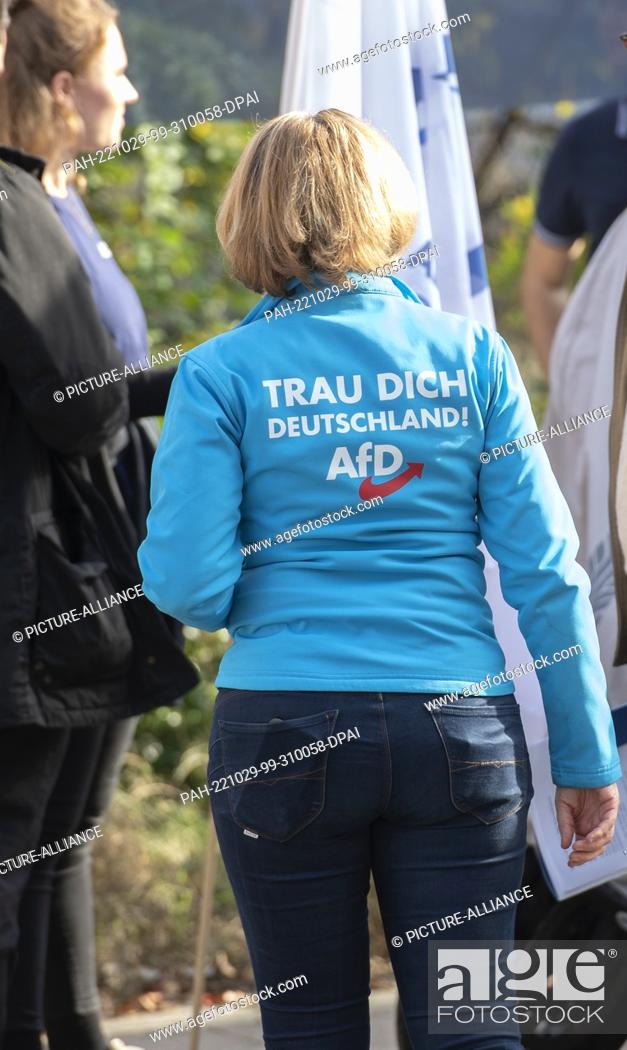 Stock Photo: 29 October 2022, Berlin: Supporters and members of the Junge Alternative, the Afd party's offspring organization, protest in Schöneberg against the opening of a.