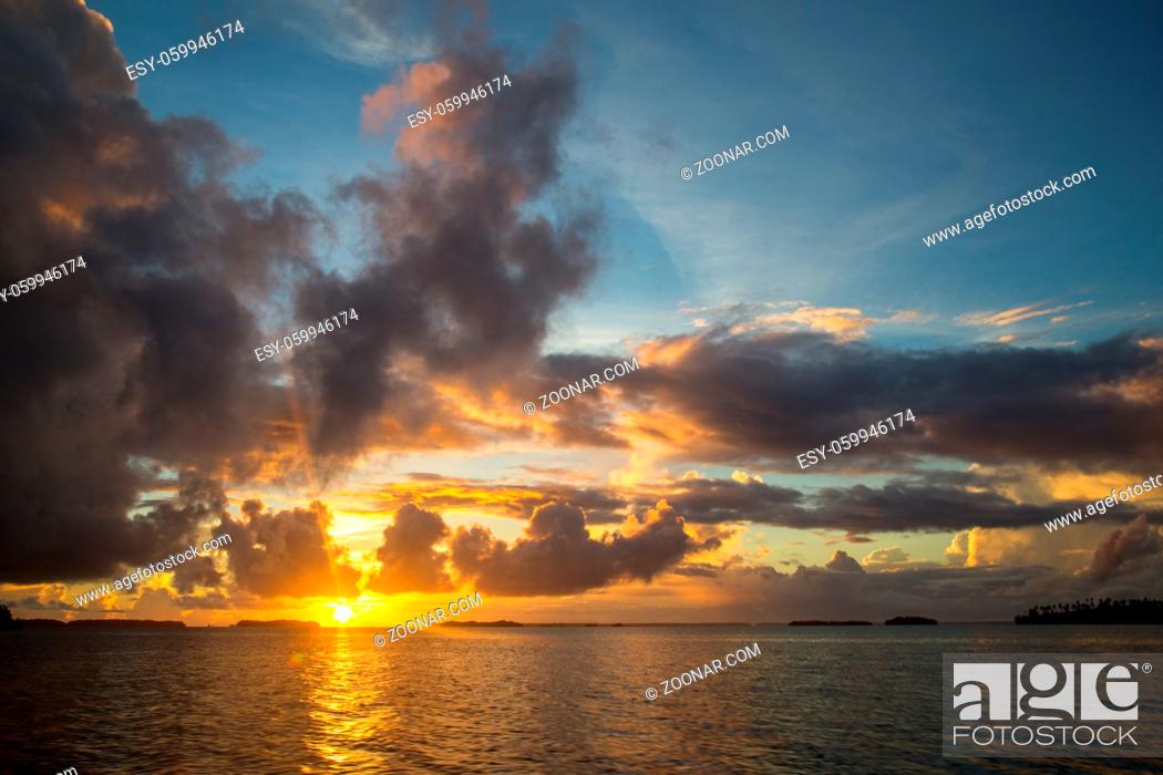 Stock Photo: Beautiful sunrise in the Marovo Lagoon on Solomon Islands.