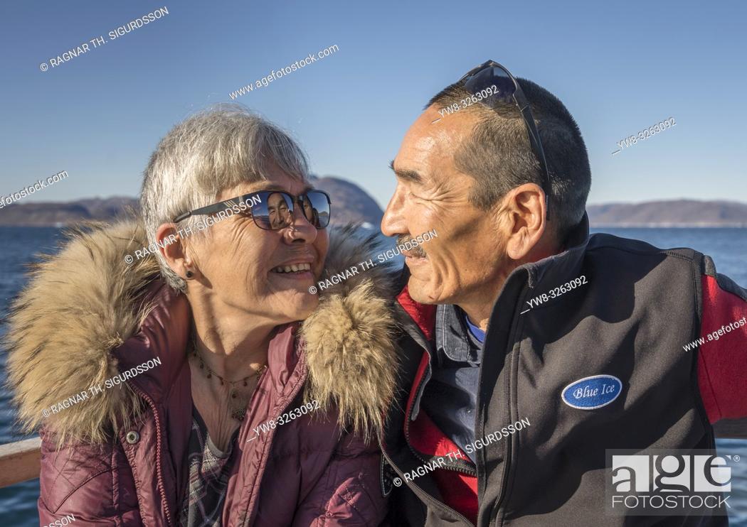 Stock Photo: Couple on Boat - Eiriksfjordur, Qaqortoq , South Greenland.