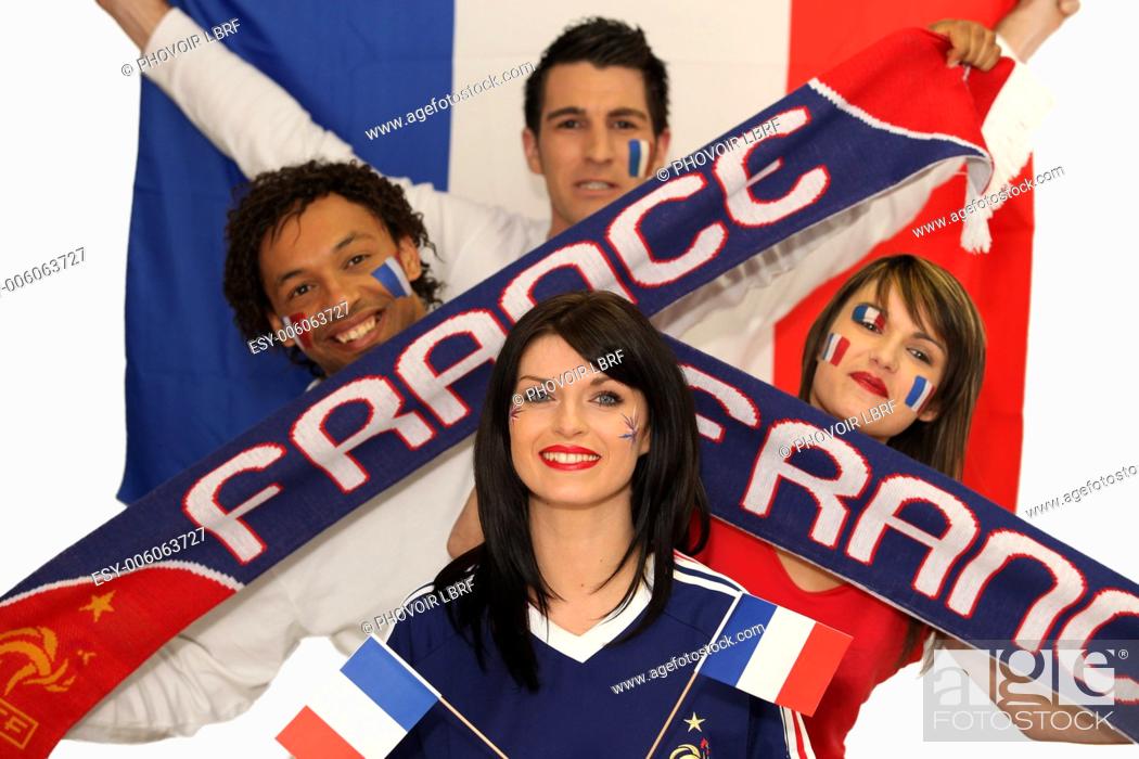 Stock Photo: Two French couples ready to support their national team.