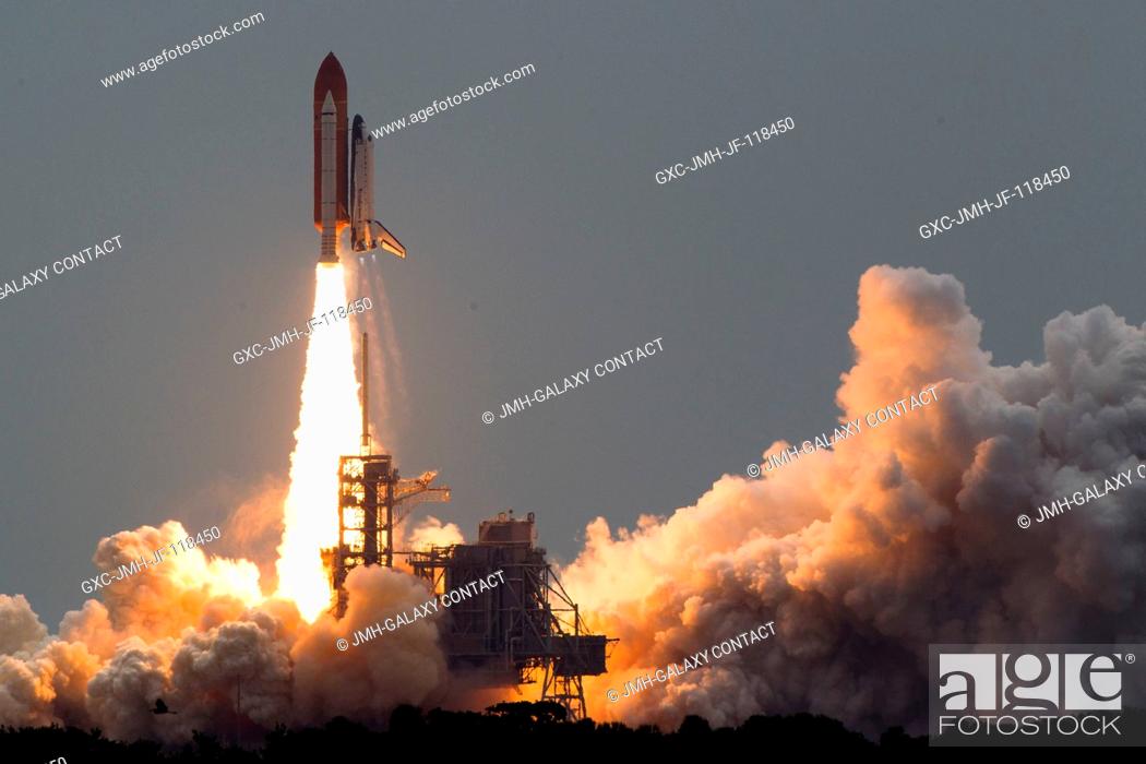 Stock Photo: The space shuttle Atlantis launches for the STS-135 mission to the International Space Station in the final mission of the Space Shuttle Program at NASA's.