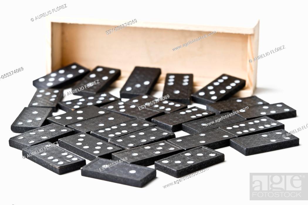 Photo de stock: Dominoes is a board game in which rectangular tiles (tiles) are used, generally white on the face and black on the back, although there are many variants.