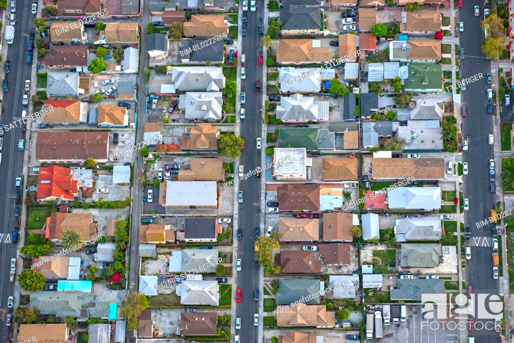 Stock Photo: Aerial view of houses in suburban cityscape.