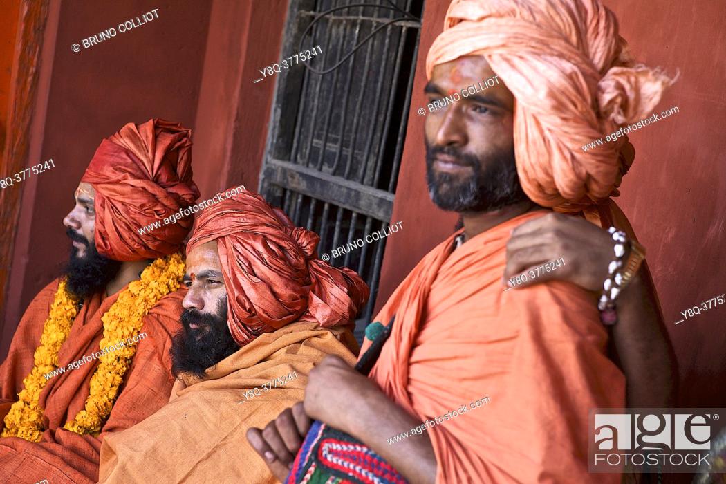 Stock Photo: naga, sadhus, and guard, during a meeting on hinduism in benares awaiting the shivaratri, UP, india.