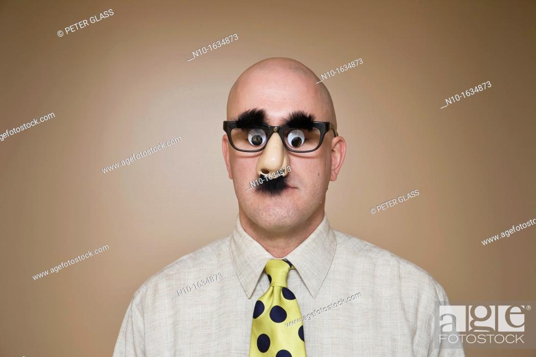 Middle-age bald man wearing funny glasses, Stock Photo, Picture And Rights  Managed Image. Pic. N10-1634873 | agefotostock