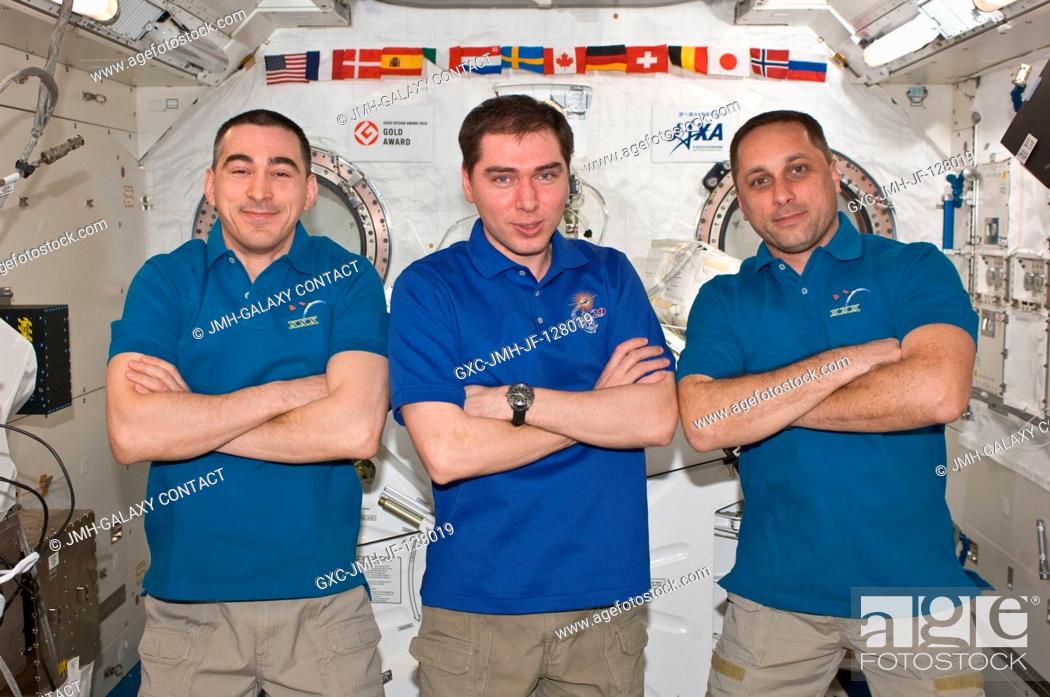 Stock Photo: Russian cosmonauts Anatoly Ivanishin (left), Expedition 30 flight engineer; Sergei Volkov (center), Expedition 29 flight engineer; and Anton Shkaplerov.