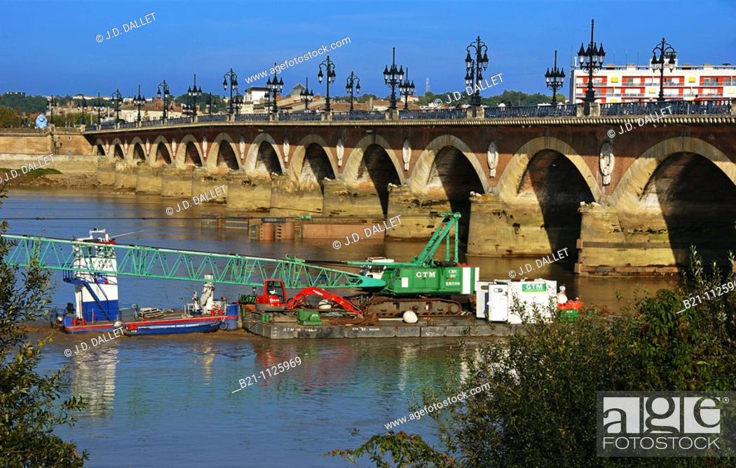 Stock Photo: Barge under the Pont de Pierre (Stone Bridge) on the Garonne river, Bordeaux, Gironde, Aquitaine, France.