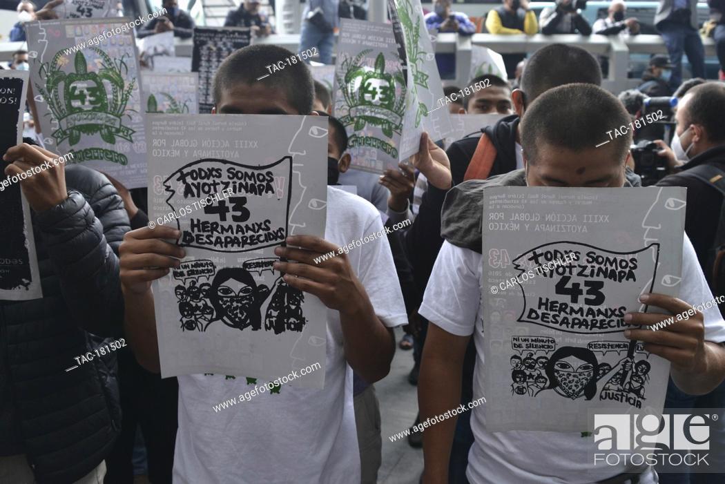 Stock Photo: MEXICO CITY, MEXICO - SEPTEMBER 25: A person joins a protest to commemorate the 6th anniversary of the 43 students of normal school who disappeared on September.