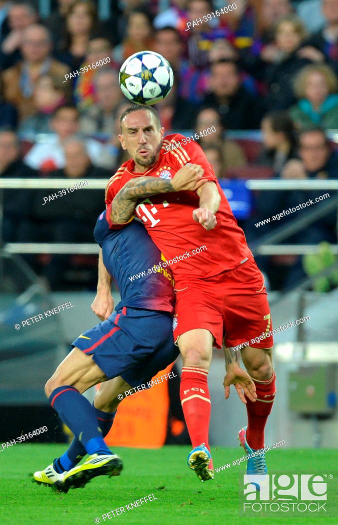 Stock Photo: Barcelona's Daniel Alves and Munich's Franck Ribery (front) vie for the ball during the UEFA Champions League semi final second leg soccer match between FC.
