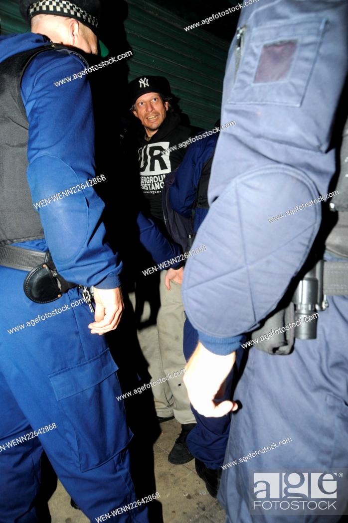 Stock Photo: Lindsay Lohans stalker Daniel Vorderwulbecke, now sectioned under the mental health act, is pictured being placed in handcuffs outside the John Lewis department.