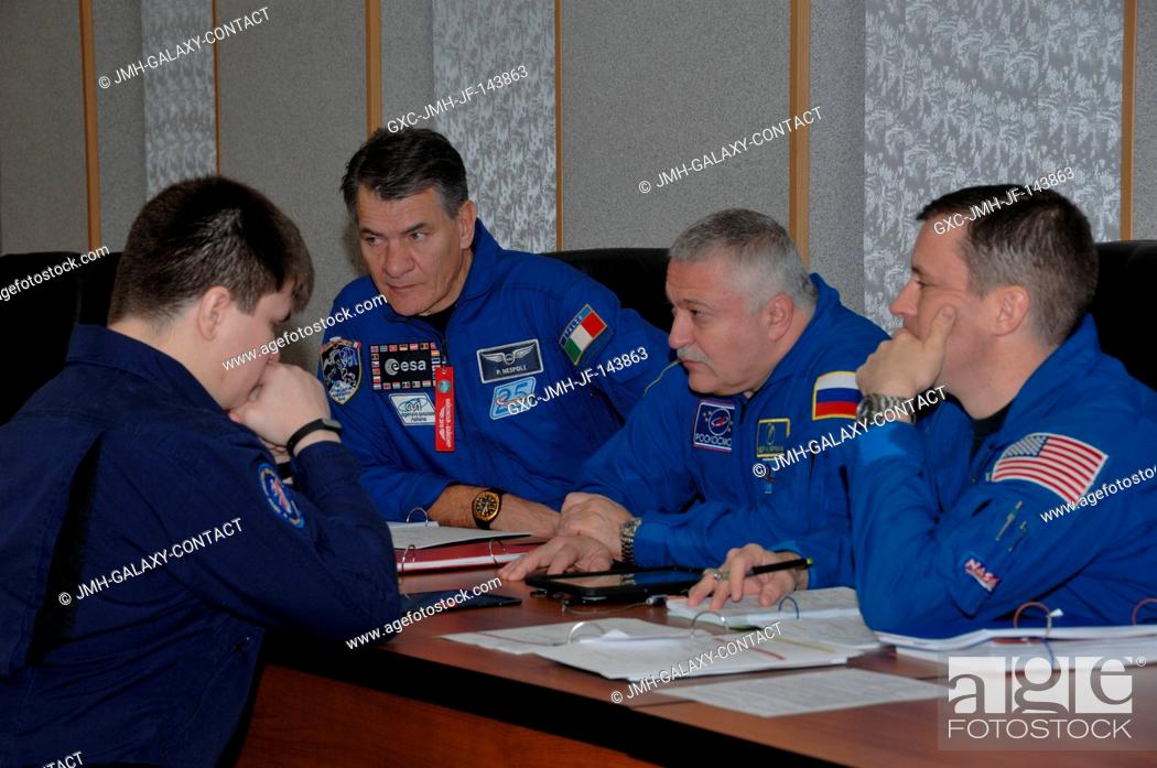 Stock Photo: At their Cosmonaut Hotel crew quarters in Baikonur, Kazakhstan, Expedition 50-51 backup crewmembers Paolo Nespoli of the European Space Agency (left).
