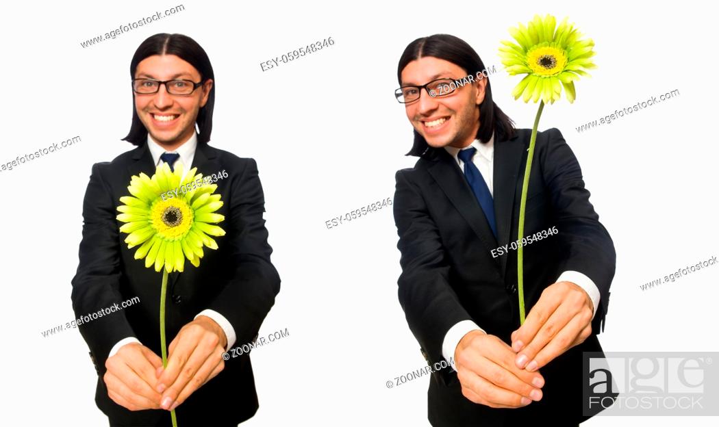 Stock Photo: Handsome businessman with flower isolated on white.