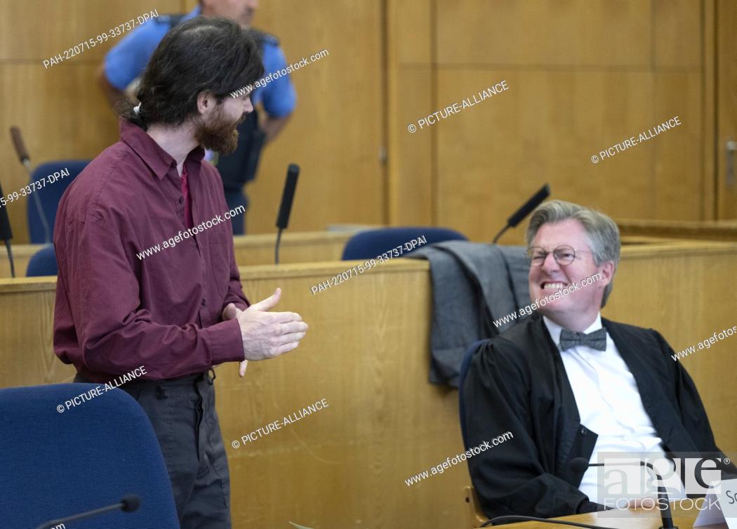 Stock Photo: 15 July 2022, Hessen, Frankfurt/Main: The defendant Franco A. (l) talks to his lawyer Moritz Schmitt-Fricke in the high-security room of the Higher Regional.
