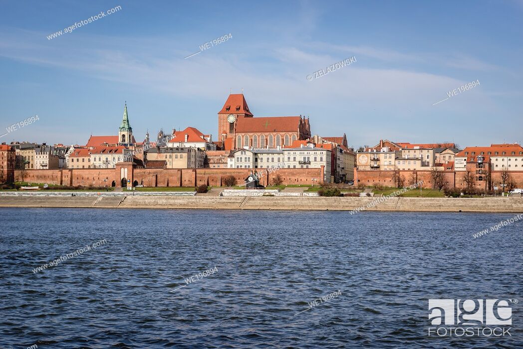 Stock Photo: Old Town in Torun city over Vistula River, Kuyavian Pomeranian Voivodeship of Poland, view with Cathedral and Holy Spirit church tower.