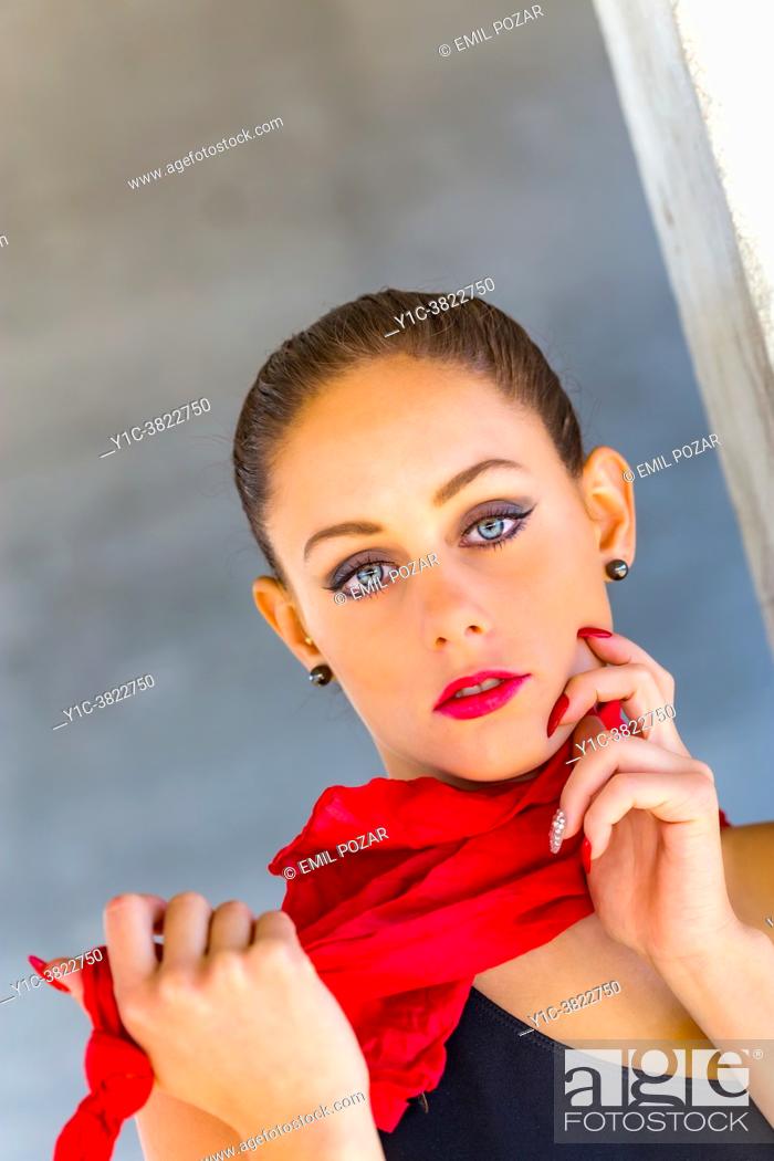 Stock Photo: Teengirl female shorthaired portrait Red lips and scarf.