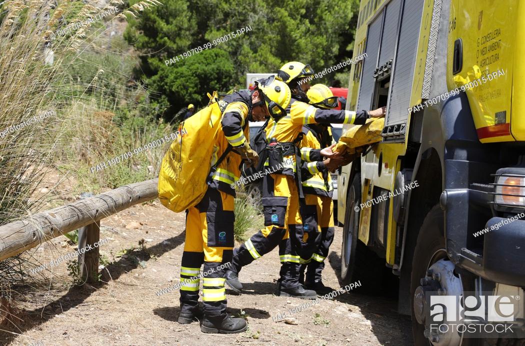 Stock Photo: 09 July 2019, Spain, Escorca: A fire in Cala Tuent, Serra de Tramuntana has burned some about 33 hectares of pine forest in Mallorca Its the first major fire.