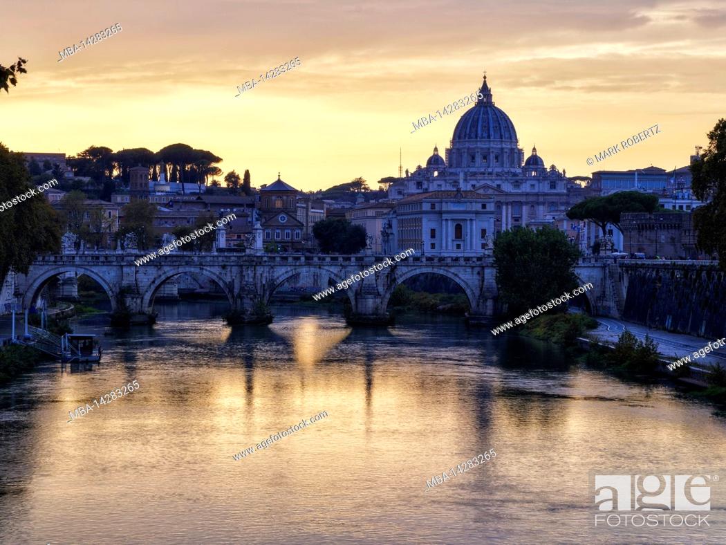 Stock Photo: View over Tiber river with Castel Sant'Angelo and St. Peter's Basilica, Rome.