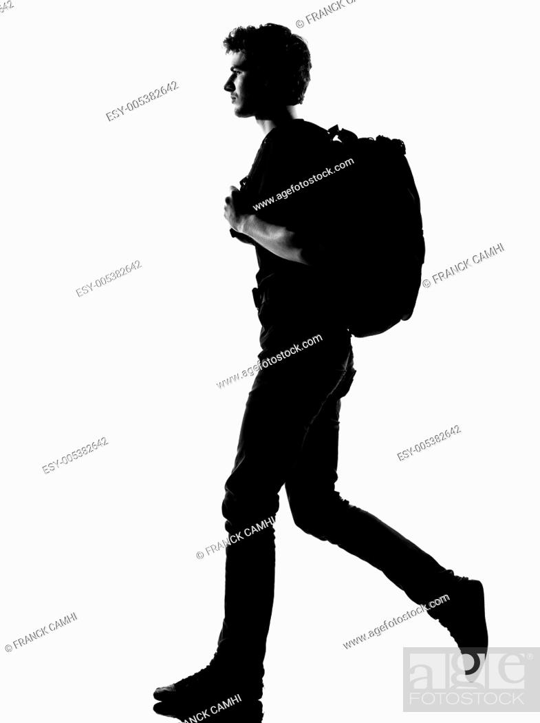 Young Man Silhouette Backpacker Walking Stock Photo Picture And