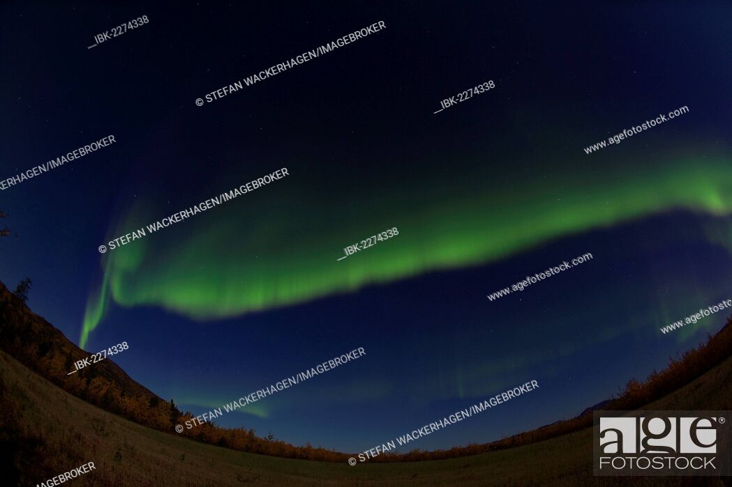 Stock Photo: Arc of northern polar lights, Aurora Borealis, green, near Whitehorse, Yukon Territory, Canada.