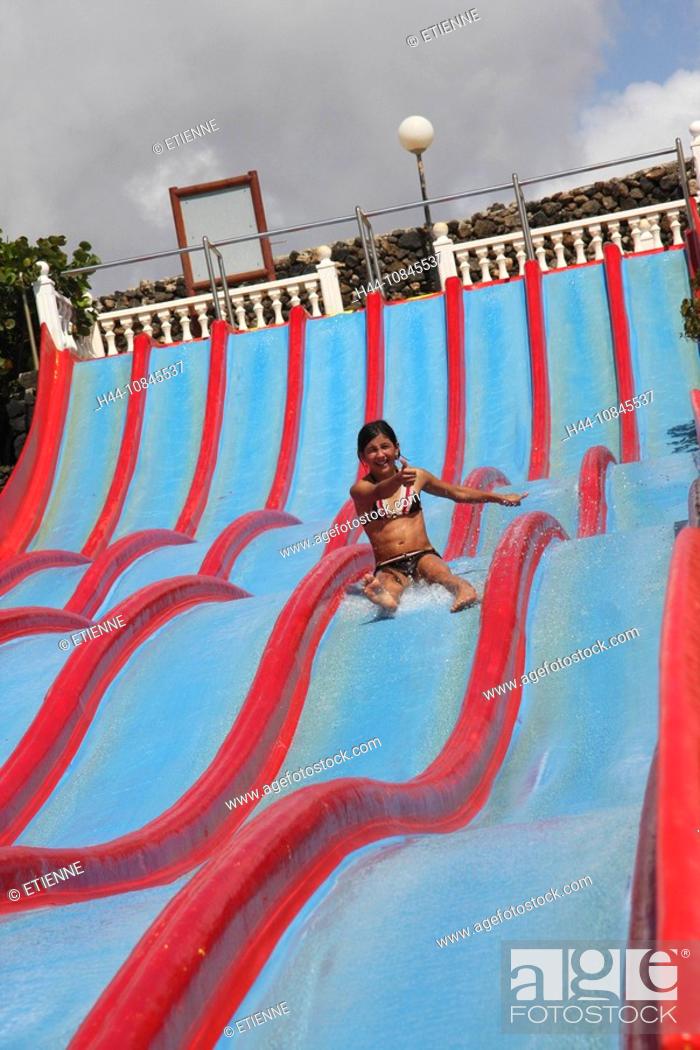 Stock Photo: Lanzarote island, Spain, Europe, Canary islands, Costa Teguise, Aquapark, water park, water slide, sliding, girl, Outd.