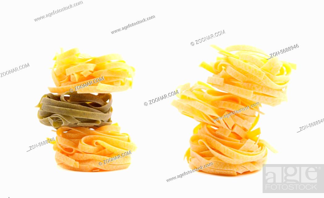 Stock Photo: Tagliatelle paglia e fieno tipycal italian pasta. White background.