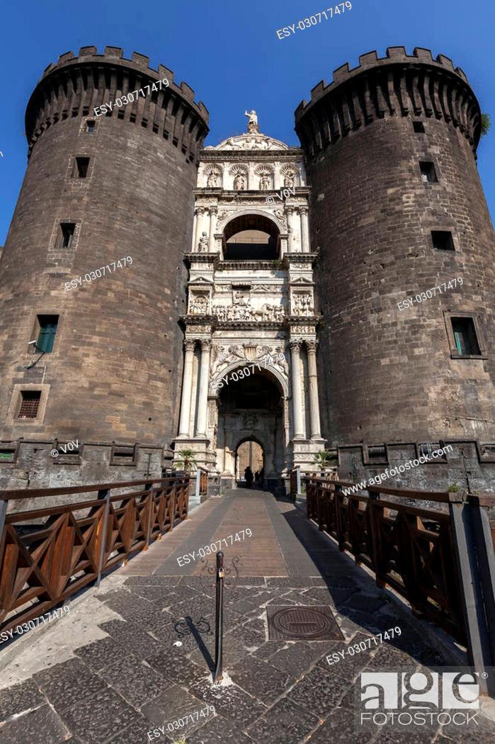 Stock Photo: Castel Nuovo (New Castle) is a medieval castle located in central Naples, Italy. First erected in 1279, it is one of the main architectural landmarks and.