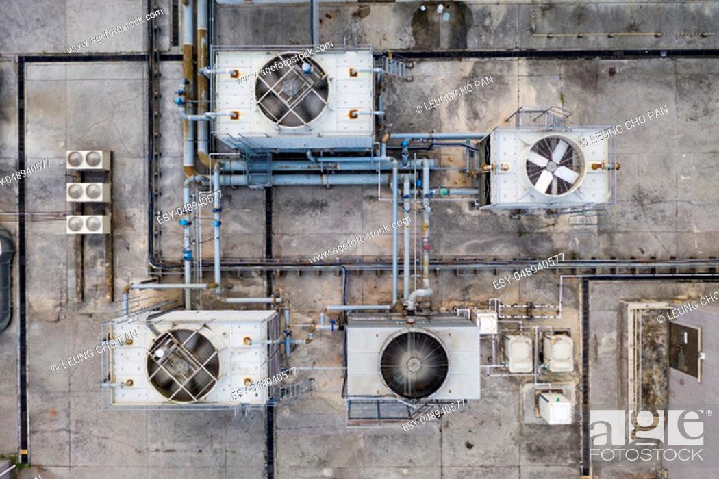 Stock Photo: Top view of Cooling tower in building roof top.
